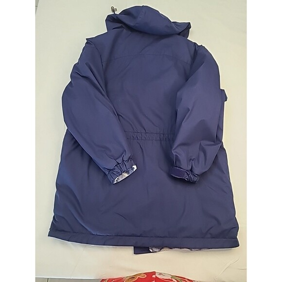 navy blue hooded anorak rain jacket with a polar bear print fleece lining. - Picture 6 of 6